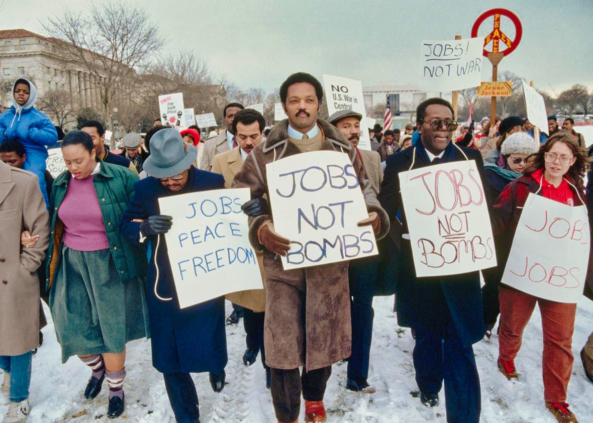 Jesse Jackson marches in a "Jobs not Bombs' rally, January 1985 (Photo: Getty Images)