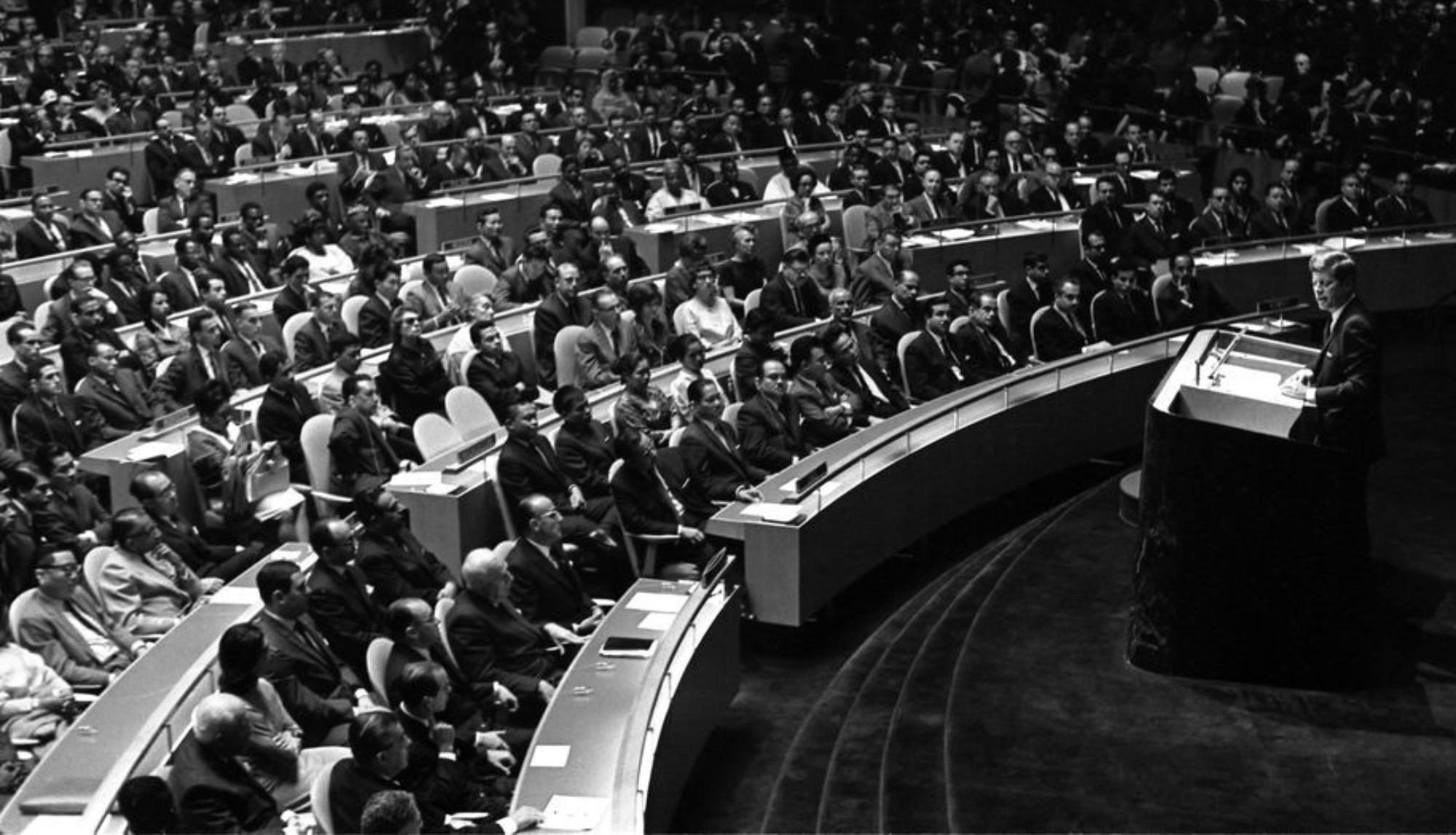At the United Nations General Assembly, President John F. Kennedy warns “Every man, woman and child lives under a nuclear sword.” Photo: Cecil Stoughton. Kennedy Presidential Library and Museum, White House Photographs, 25 September 1961.