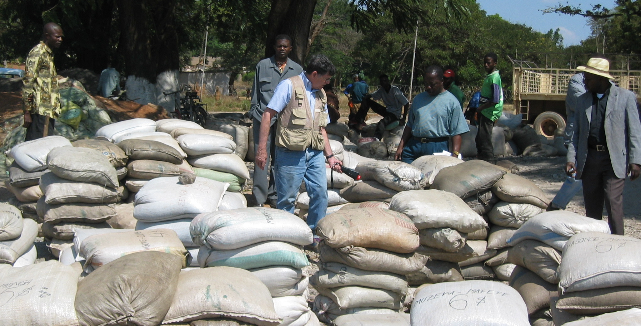 Robert Kelley measuring sacks of ore to identify any containing uranium as a major impurity, Kolwezi, the Democratic Republic of Congo, 2005. Photo provided by Robert Kelley.